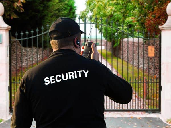 a security guard at a resort gate